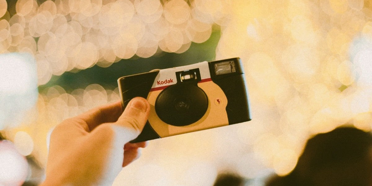 IN A FLASH: HISTORY AND LEGACY OF THE DISPOSABLE CAMERA