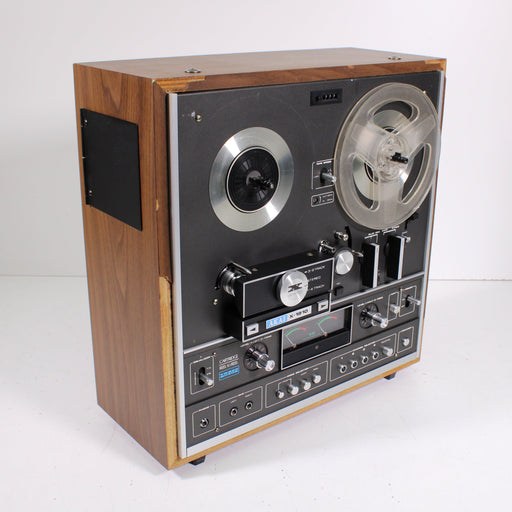 Old vintage reel-to-reel player. Tape recorder with spools. Bobbin
